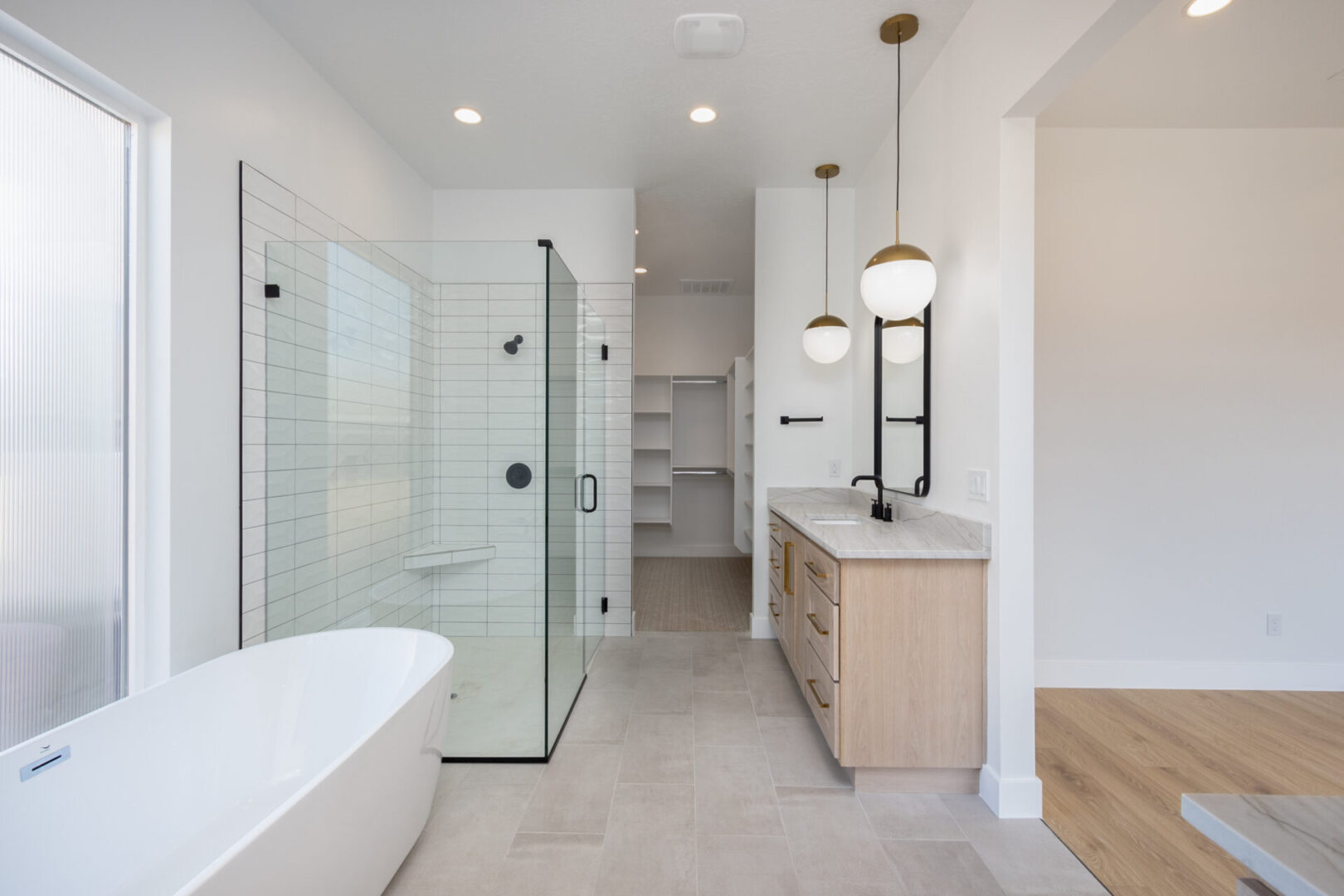 A shower area with glass walls